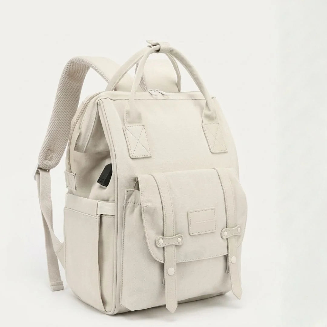 Beige backpack on a white background