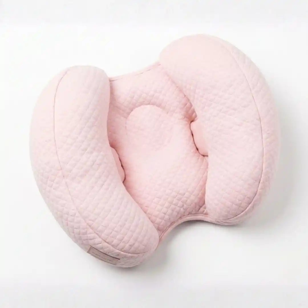 Butterfly infant head support cushion in pink with soft butterfly-shaped design