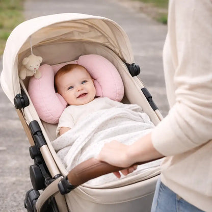 Blue butterfly infant head support cushion shown on a pram or stroller seat