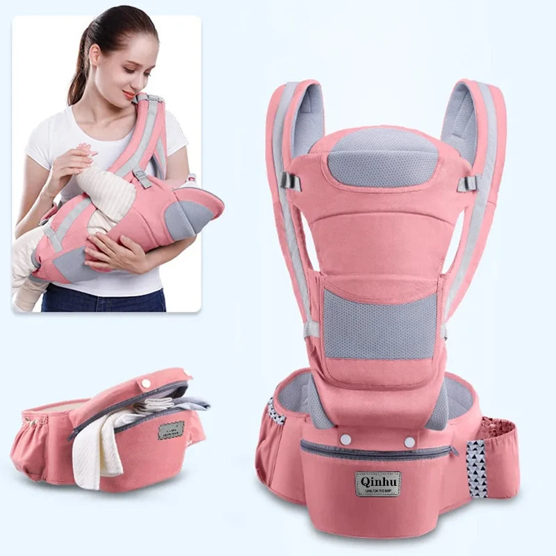 Parent wearing ergonomic hip seat baby carrier with baby in secure front carry position